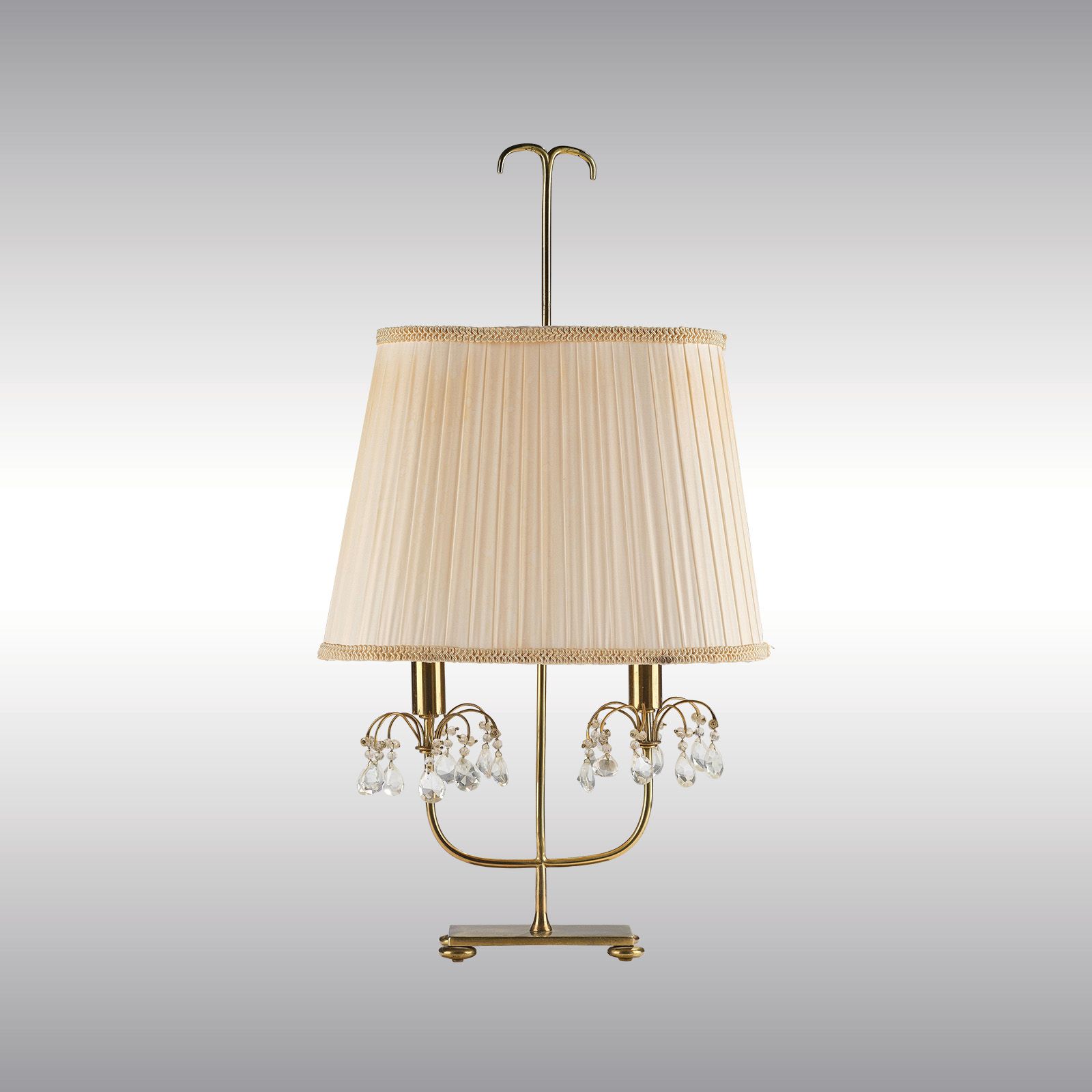 WOKA LAMPS VIENNA - OrderNr.: 80134|A two-light table lamp with bevelled glass pendants, designed by Hans Harald Rath (attributed), c. 1950, executed by J. & L. Lobmeyr, Vienna