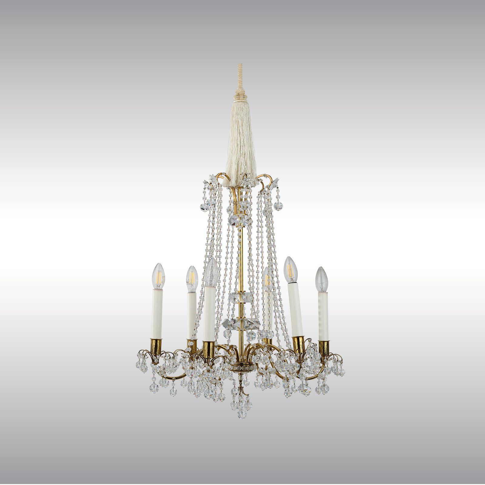 WOKA LAMPS VIENNA - OrderNr.: 80142|Sechsflammiger Luster mit geschliffenen Glasbehängen, um 1900 - Design: Austrian Mastercraft