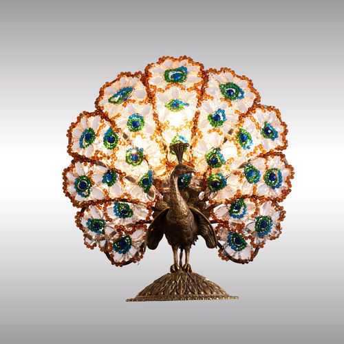 80128 - A table or fireplace lamp with a peacock and coloured glass ornaments, designed in around 1920/30 WOKA LAMPS VIENNA - OrderNr.: 80128|A table or fireplace lamp with a peacock and coloured glass ornaments, designed in around 1920/30 - Foto 1